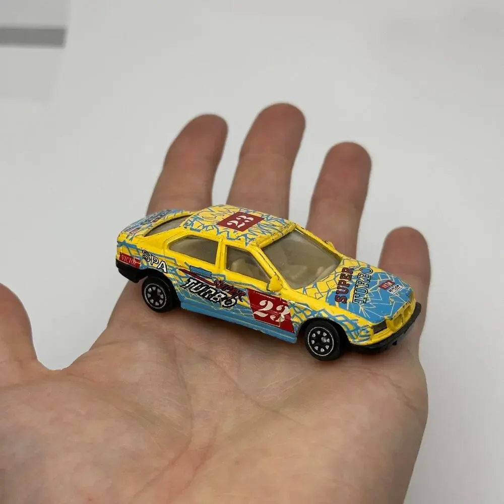 Vintage 90s Pioneer BMW 3 Series Turbo 1:64 Diecast Yellow Mini Car